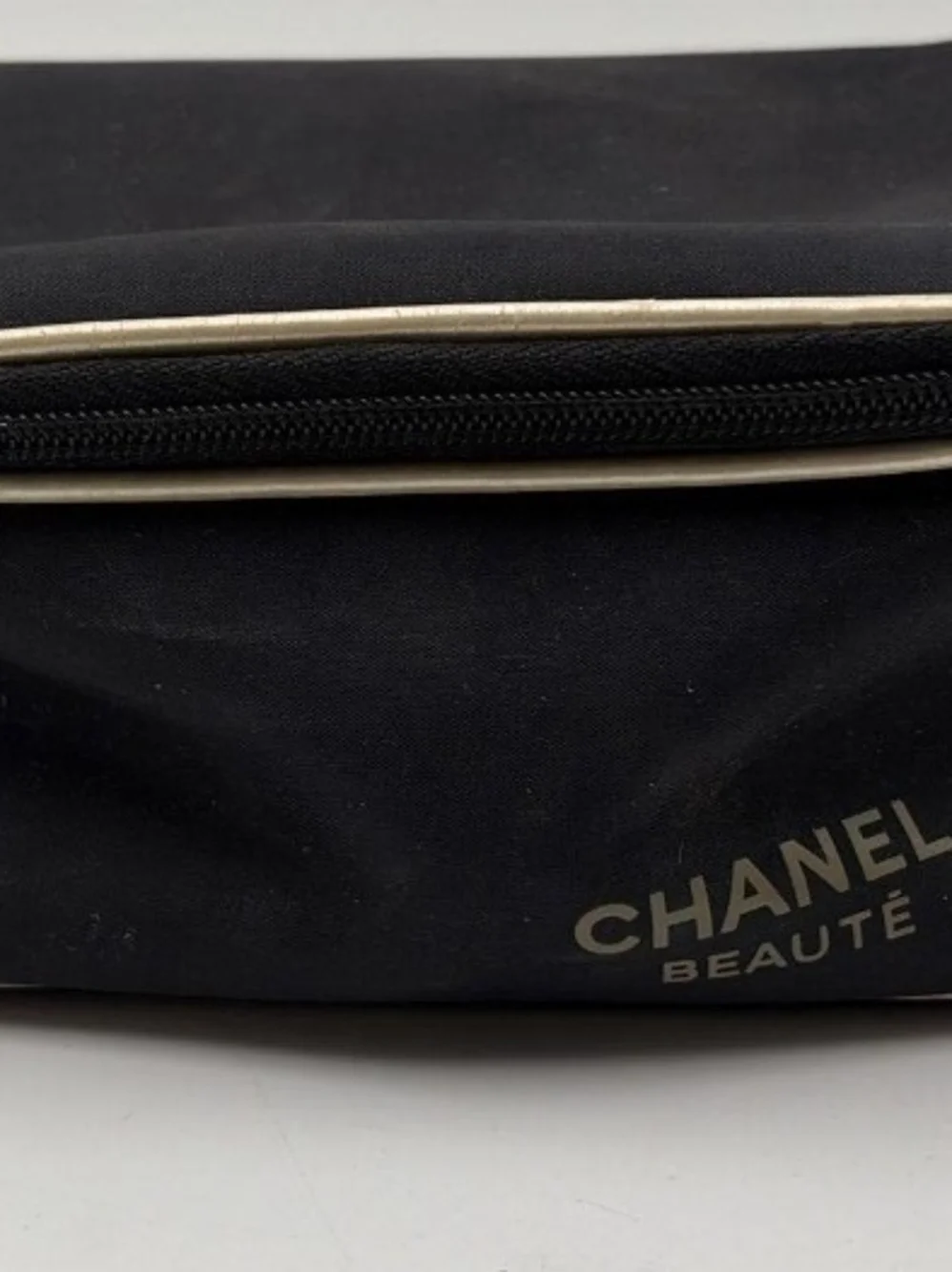 CHANEL Black Cosmetic Pouch with Gold Accent